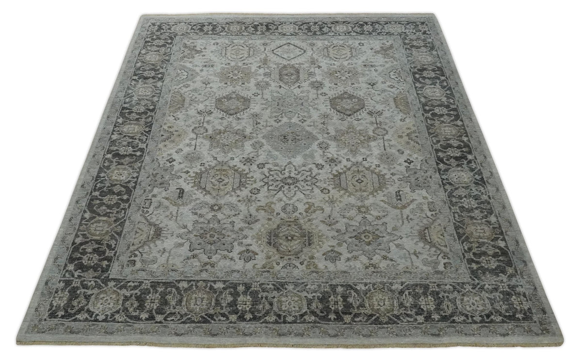 Antique Distressed style Ivory, Charcoal and Beige Low Pile 8x10 wool Area Rug.