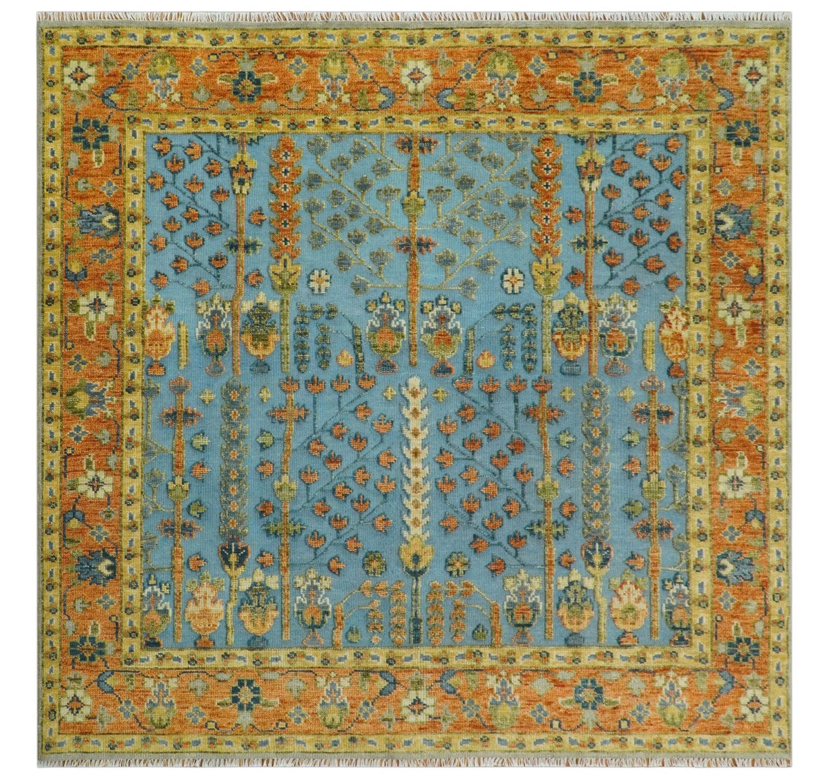 Custom Made Hand Knotted Blue and Rust Tree Design Low pile Wool Area Rug.