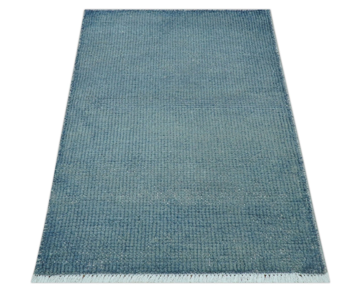 Custom Made Modern Solid Overdyed Light Blue Hand Knotted Wool Area Rug.