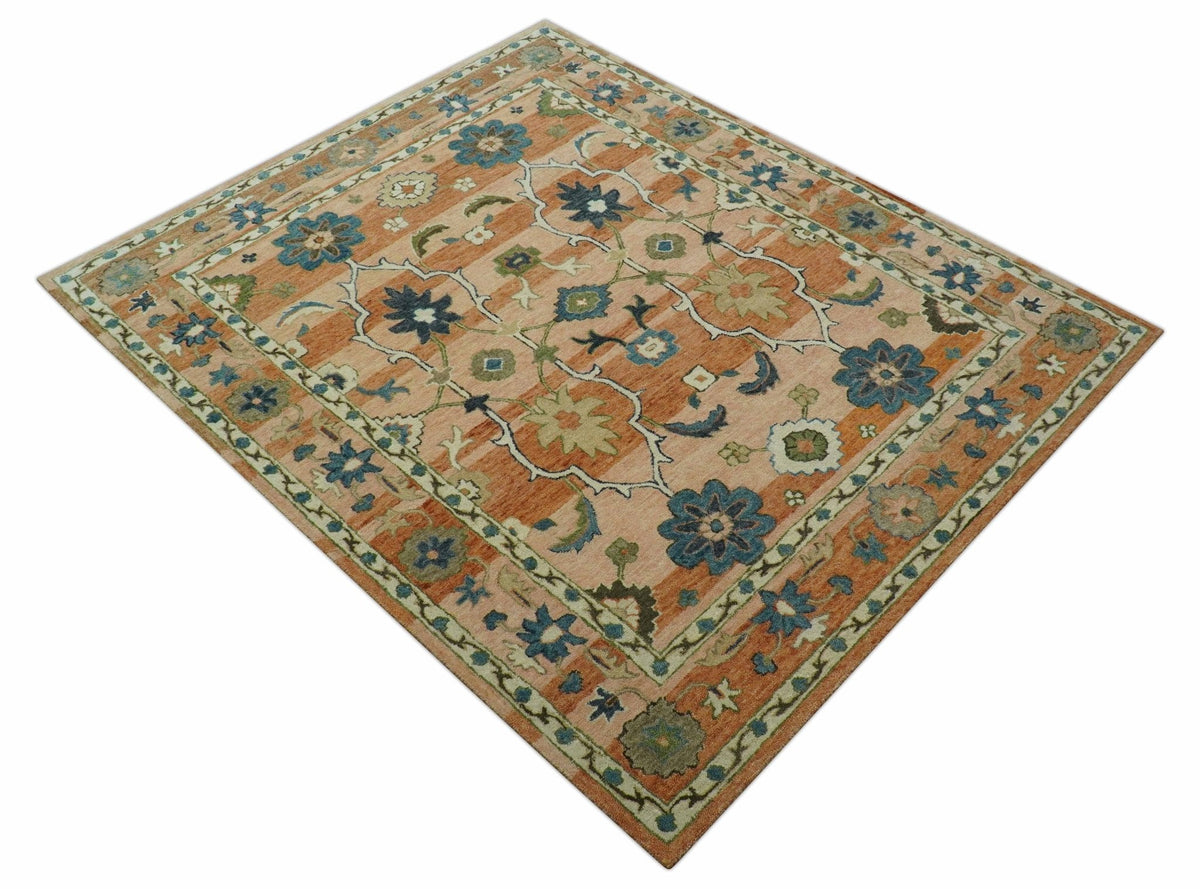 Custom Made Transitional Peach and Blue Hand Tufted Wool Area Rug.