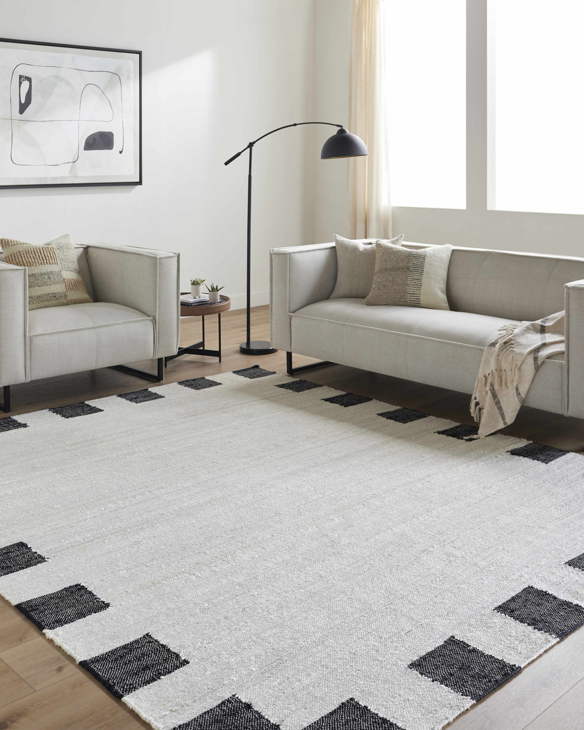 Rocio Dotted Bordered White Jute Carpet.