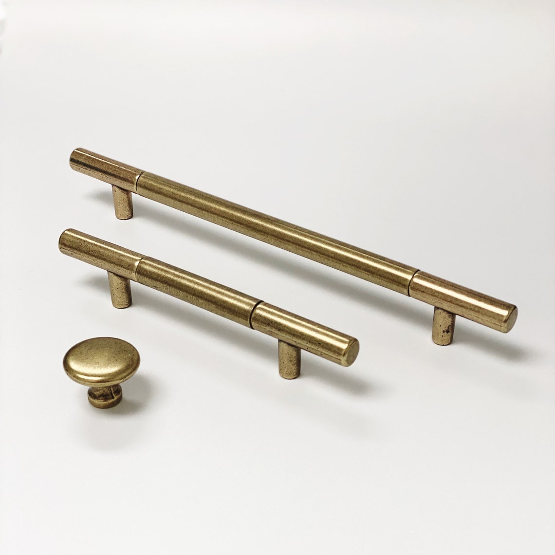 Sydney Aged Brass Cabinet Knob and Drawer Pulls.