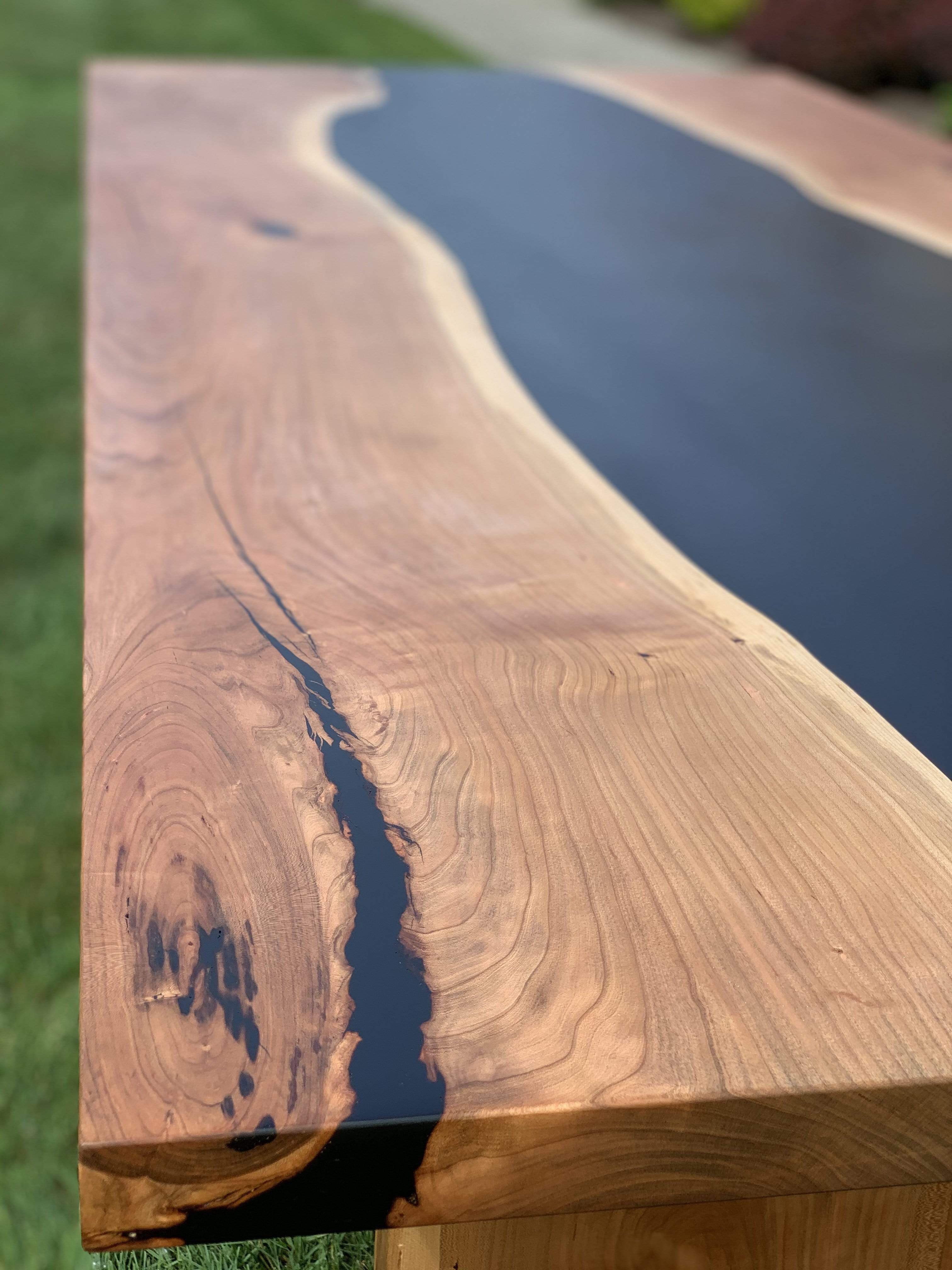Modern Style Epoxy River Table Featuring Cherry Wood and Live Edge