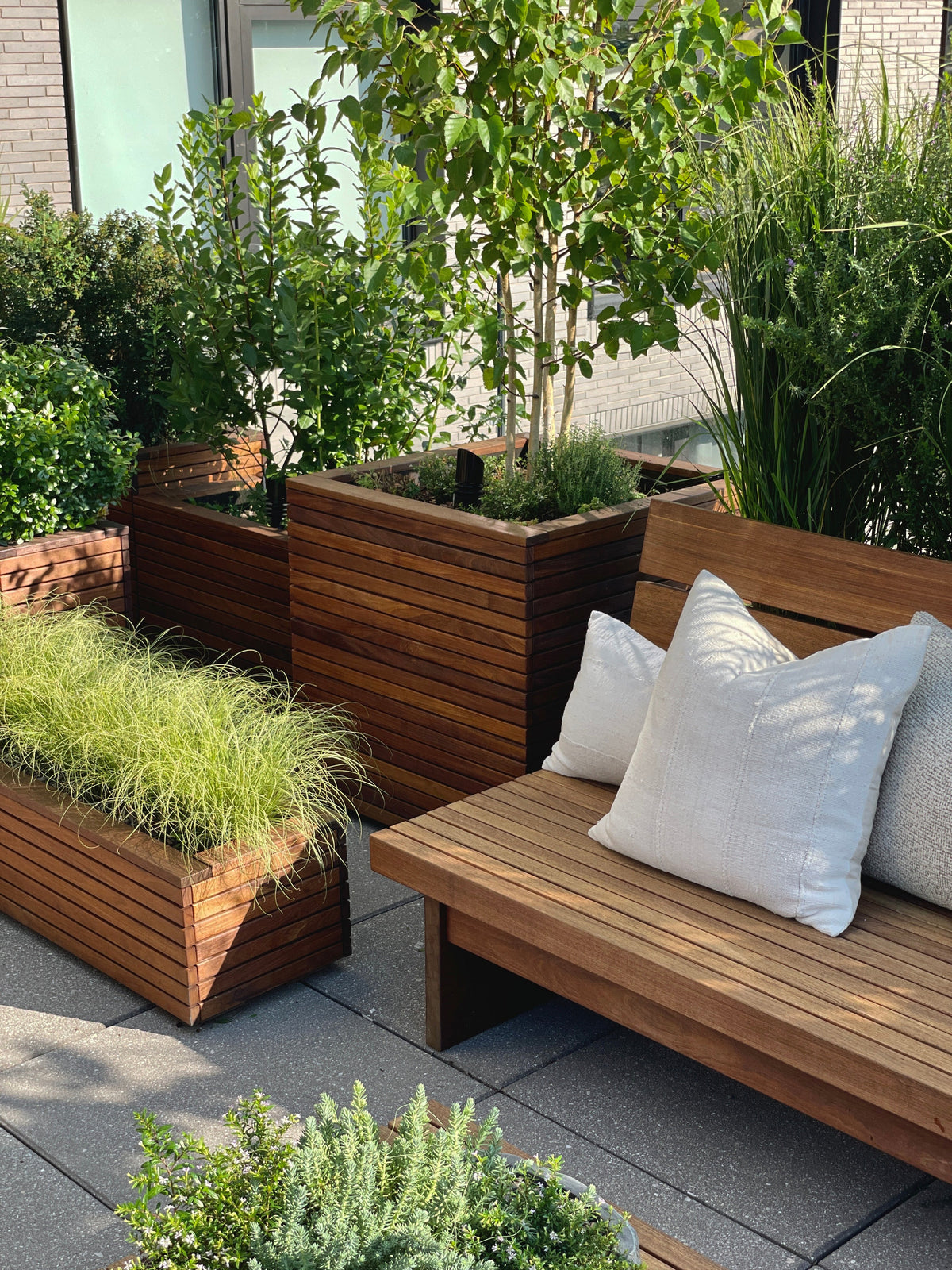 Transform Your Outdoor Space with Custom Made Planters and Benches