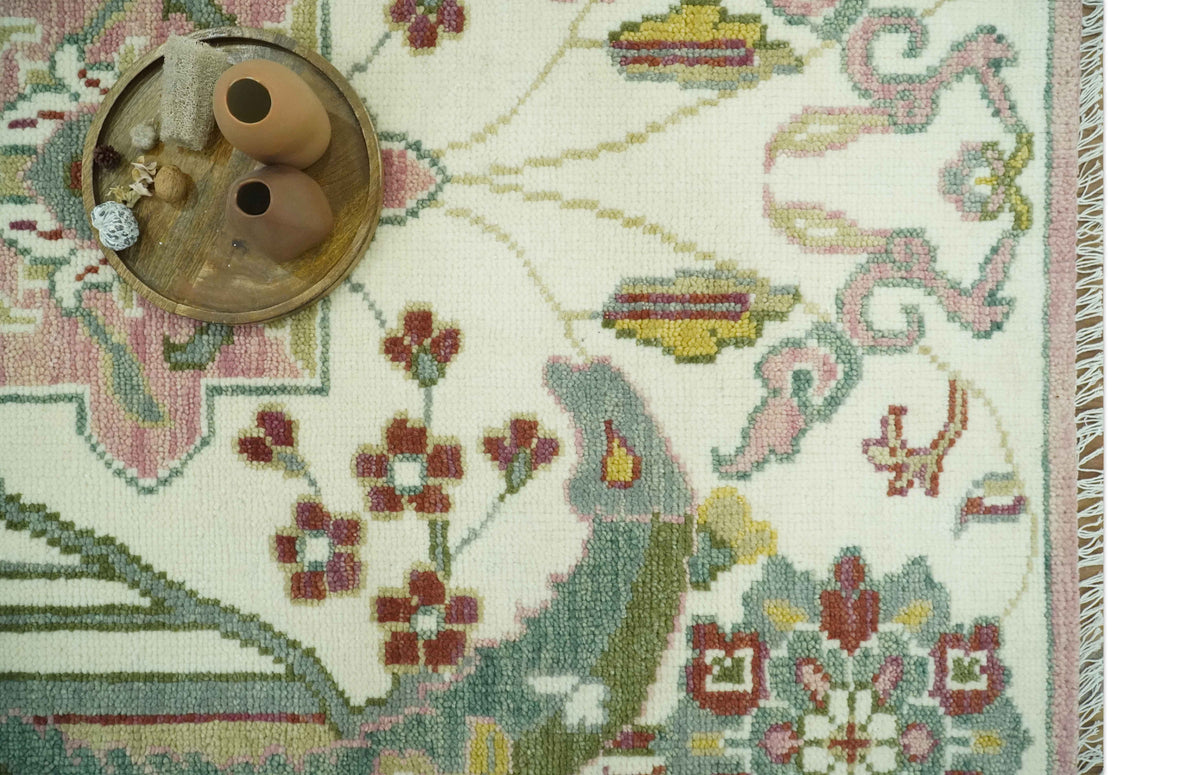 The Peacock Garden Ivory and Green Bird Hand Knotted Multi size Wool Area Rug.