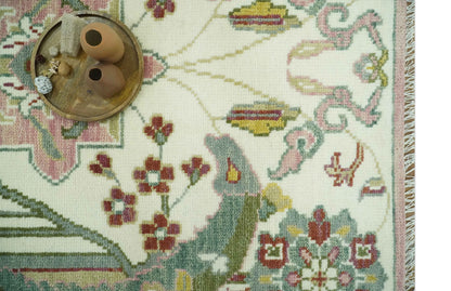 The Peacock Garden Ivory and Green Bird Hand Knotted Multi size Wool Area Rug.