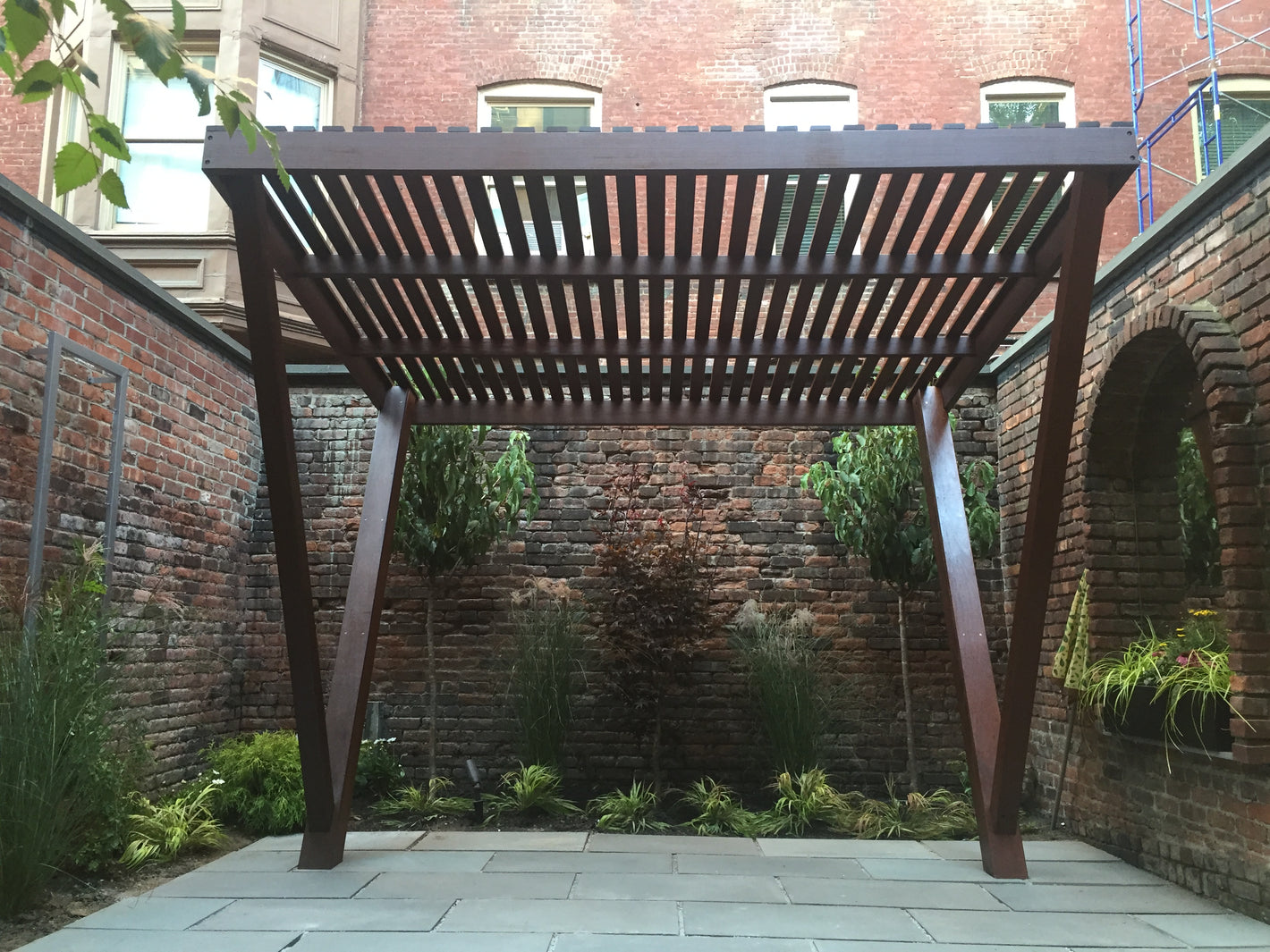 Outdoor free standing wood pergola in the backyard created by TCSC