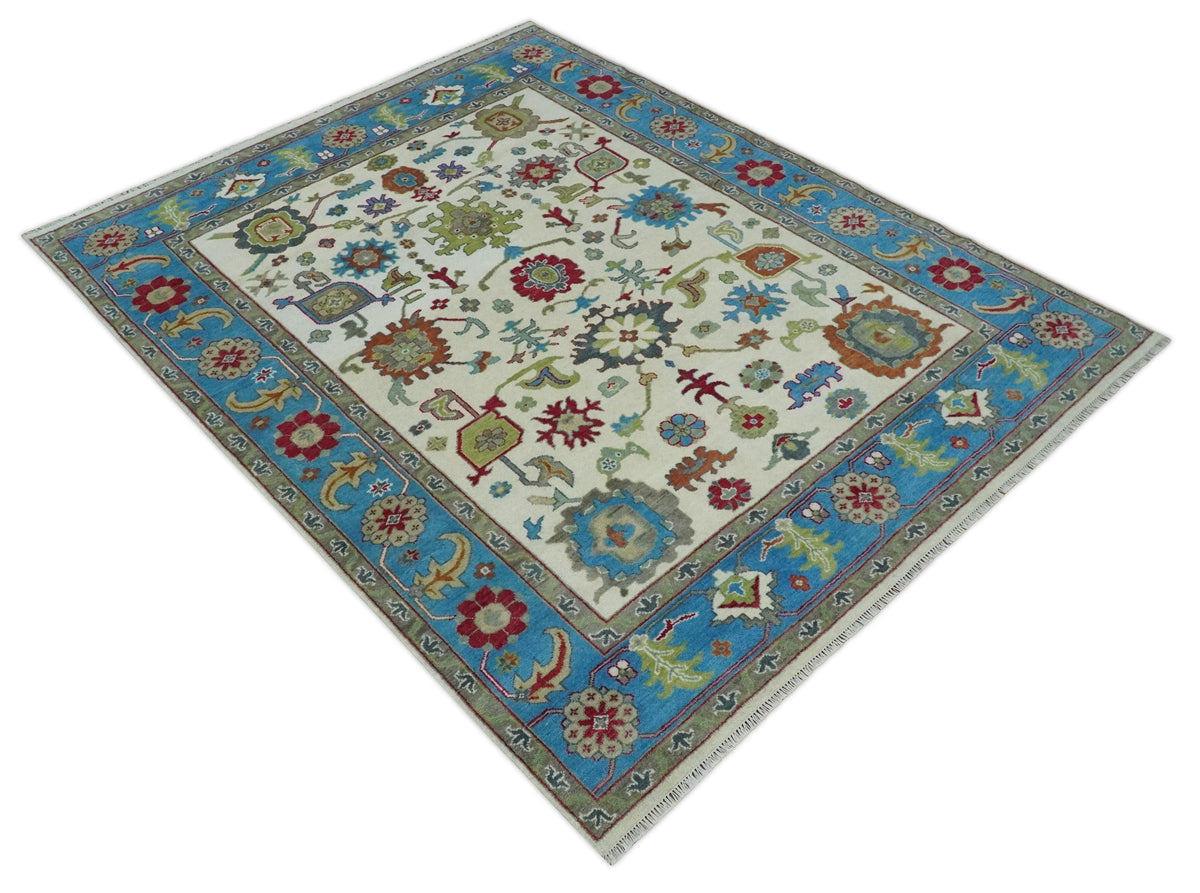 Fine Traditional Ivory and Blue Colorful Hand knotted Oushak Wool Area Rug.