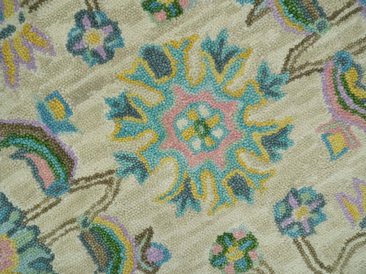 Custom Made Beige, Blue and Purple Traditional Floral Hand Tufted wool rug.