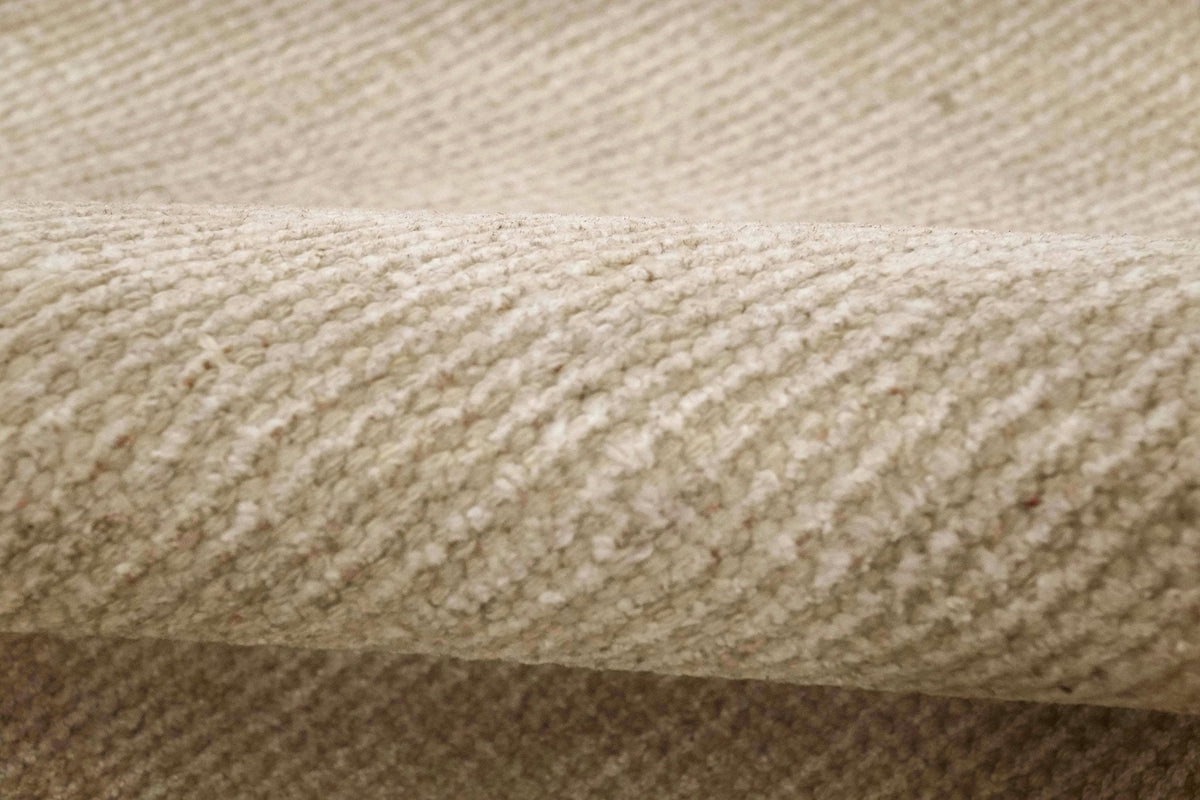 Modern Solid Beige Hand Woven Wool Area Rug.