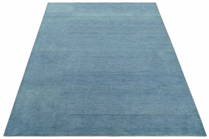 Custom Made Solid Plane Light Blue Woolen Hand Tufted wool area Rug.