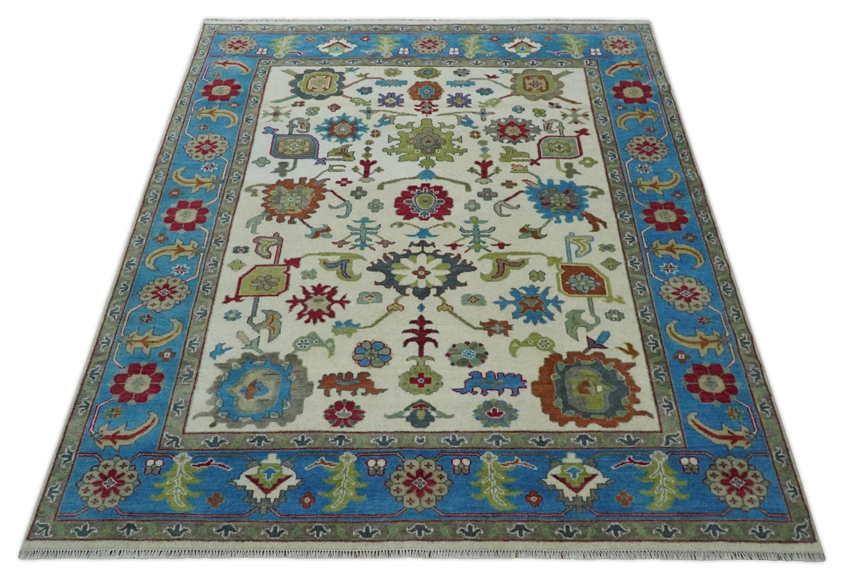 Fine Traditional Ivory and Blue Colorful Hand knotted Oushak Wool Area Rug.
