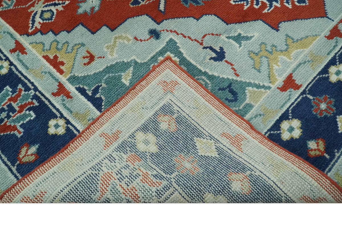 Custom Made Rust, Blue and Silver hand knotted Traditional Heriz wool area rug.