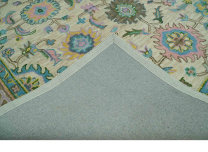Custom Made Beige, Blue and Purple Traditional Floral Hand Tufted wool rug.