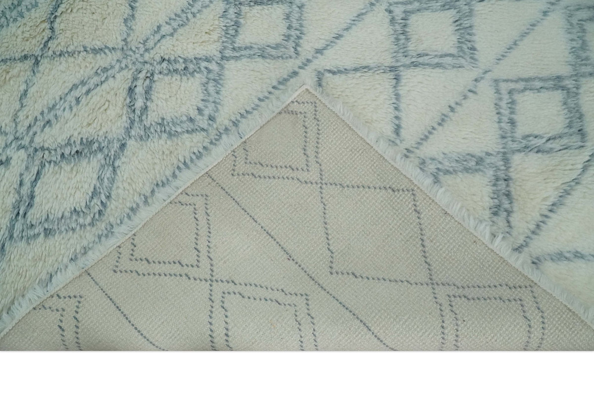 Modern Ivory and Blue Moroccan Hand Made Wool Area Rug.