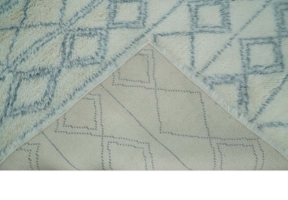 Modern Ivory and Blue Moroccan Hand Made Wool Area Rug.