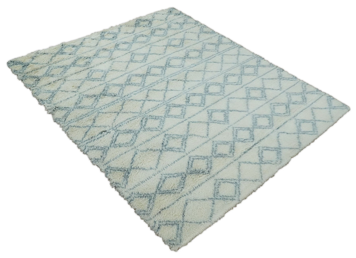 Modern Ivory and Blue Moroccan Hand Made Wool Area Rug.