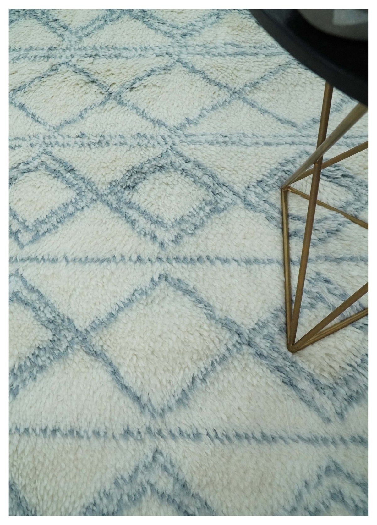 Modern Ivory and Blue Moroccan Hand Made Wool Area Rug.