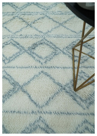 Modern Ivory and Blue Moroccan Hand Made Wool Area Rug.