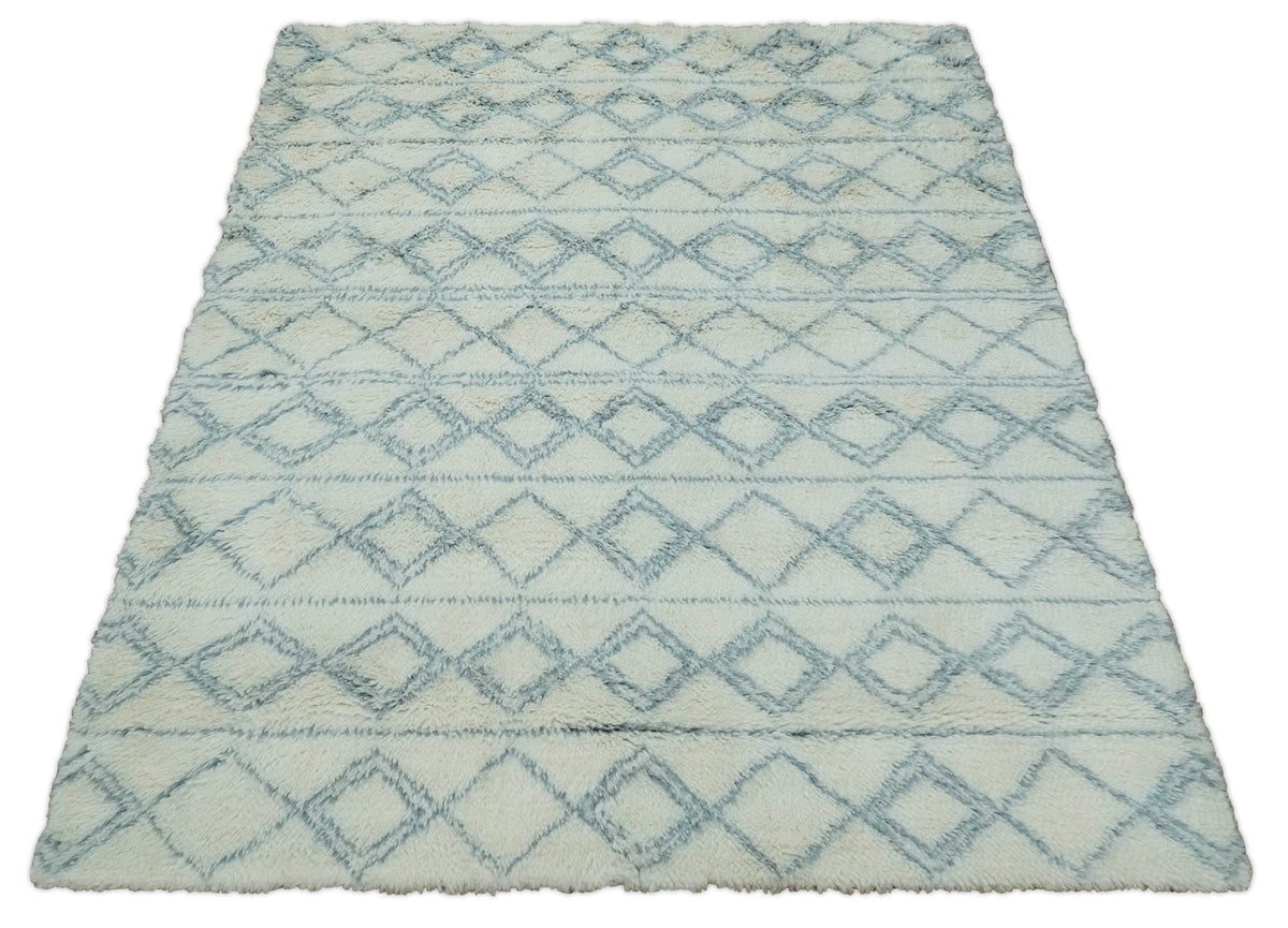 Modern Ivory and Blue Moroccan Hand Made Wool Area Rug.