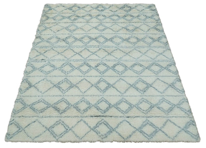 Modern Ivory and Blue Moroccan Hand Made Wool Area Rug.