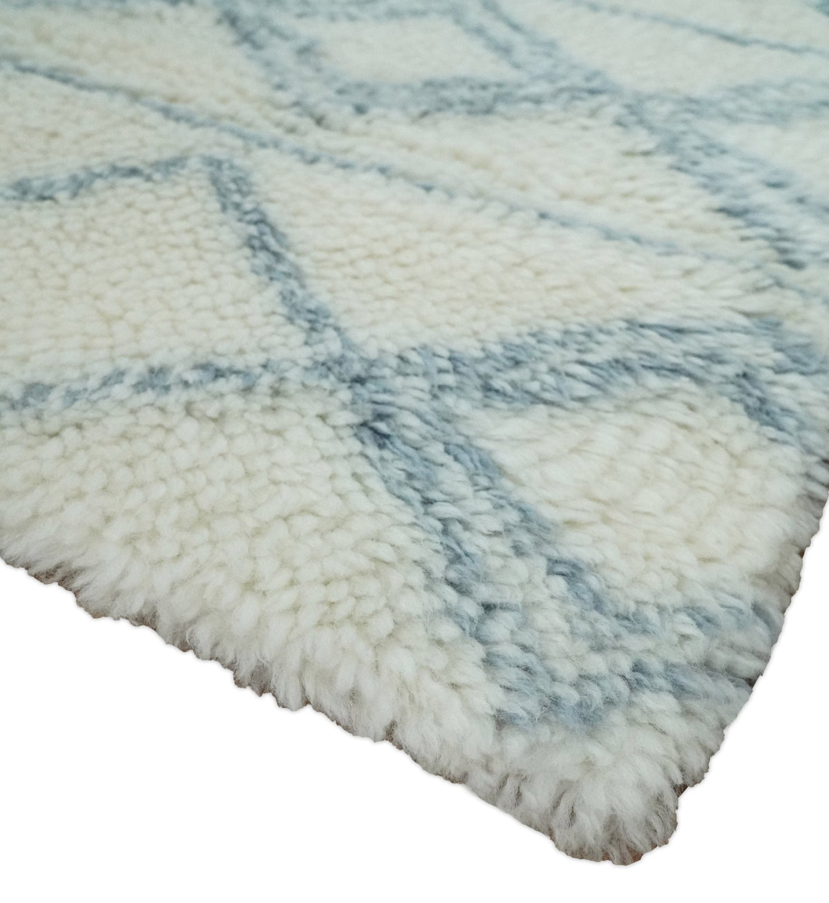 Modern Ivory and Blue Moroccan Hand Made Wool Area Rug.