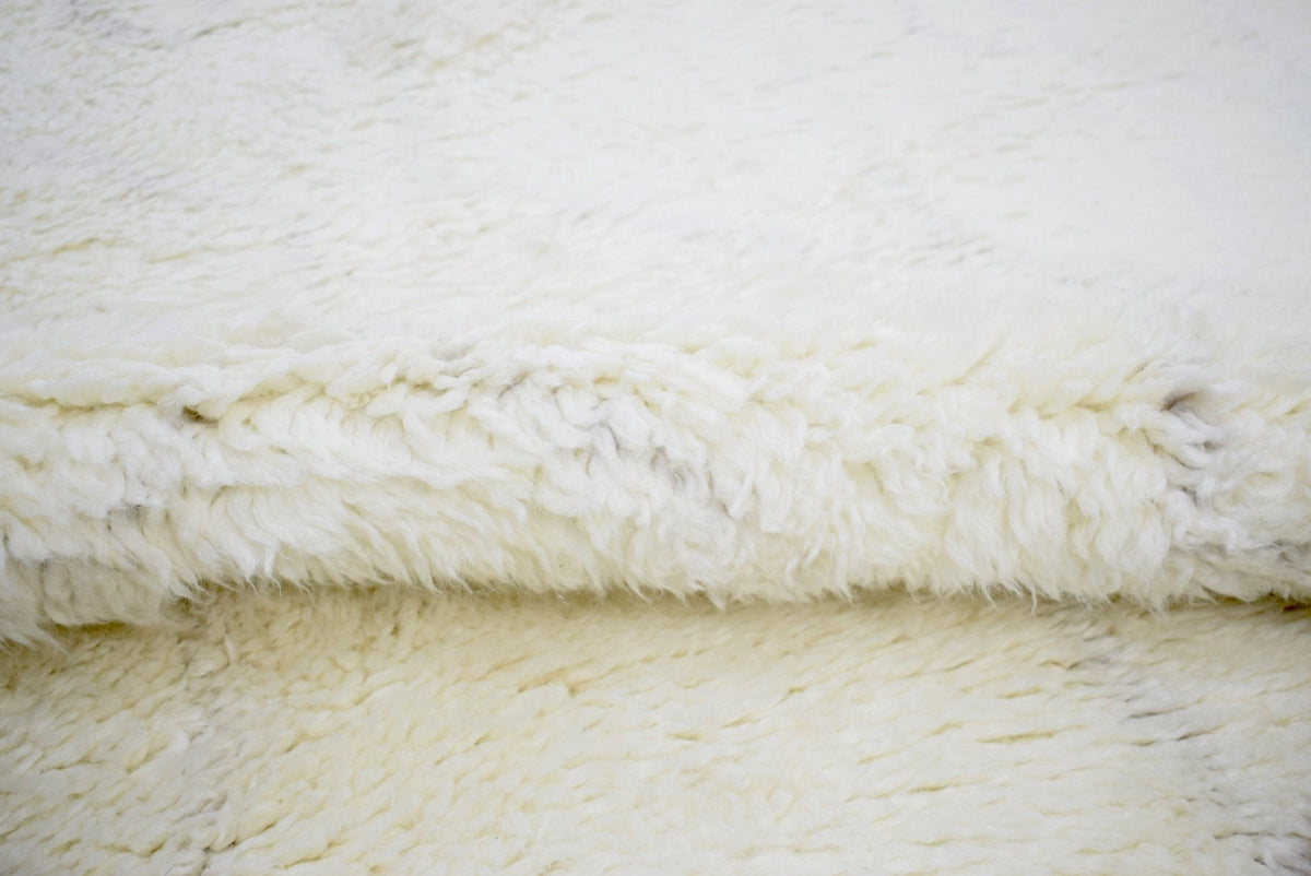 Ivory Modern Style Handmade Wool Area Rug.