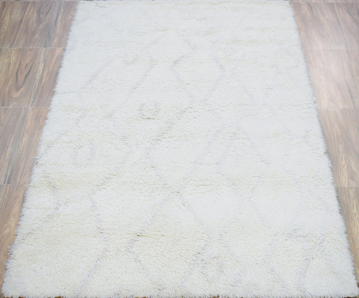 Ivory Modern Style Handmade Wool Area Rug.