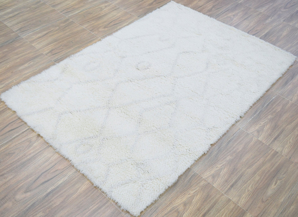 Ivory Modern Style Handmade Wool Area Rug.