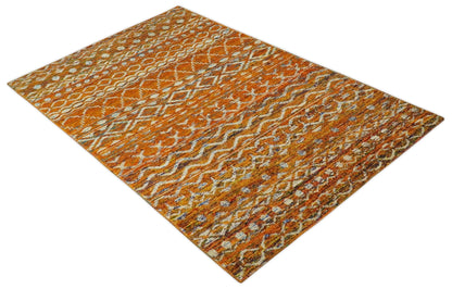 Hand Knotted Gold, Rust and Ivory Modern Contemporary Tribal Trellis Recycled Silk Area Rug.