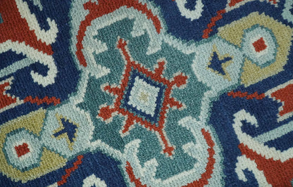 Custom Made Rust, Blue and Silver hand knotted Traditional Heriz wool area rug.