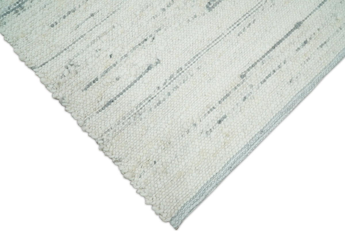 Modern Ivory and Gray Hand Made 5x8 Wool Area Rug.