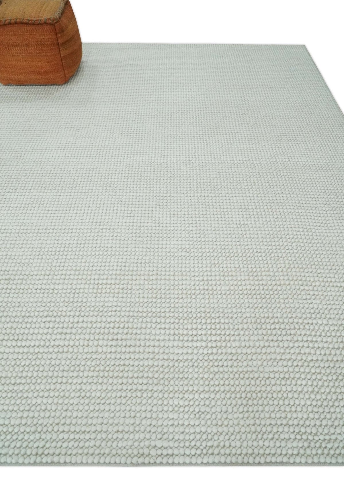 Contemporary Solid Design Ivory Handwoven Wool Area Rug.