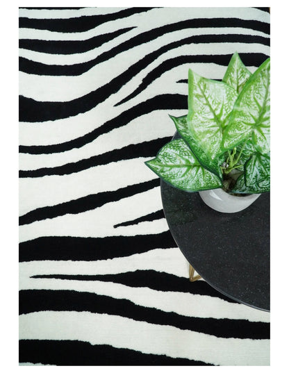 Modern Zebra Hand Tufted Black and White Wool Area Rug.