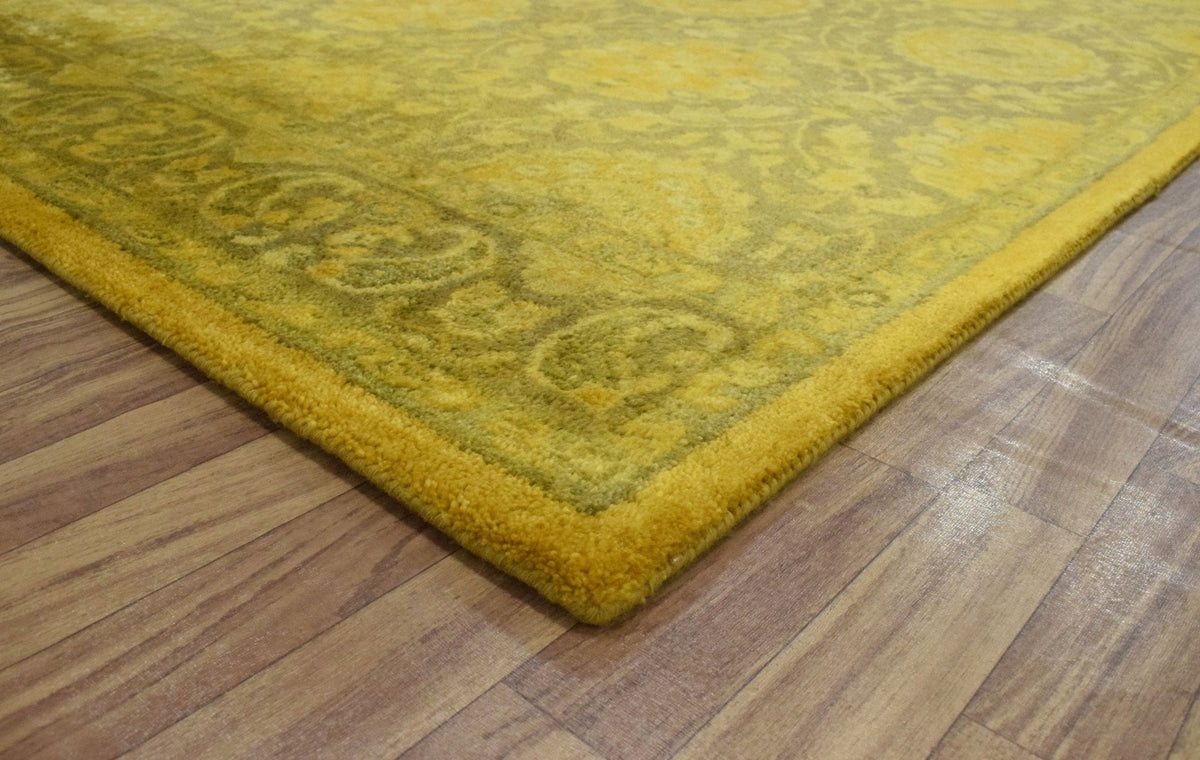 Traditional Floral Design Gold Hand Tufted Overdyed Wool Area Rug.