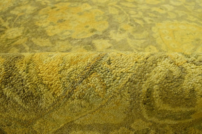 Traditional Floral Design Gold Hand Tufted Overdyed Wool Area Rug.