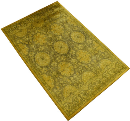 Traditional Floral Design Gold Hand Tufted Overdyed Wool Area Rug.