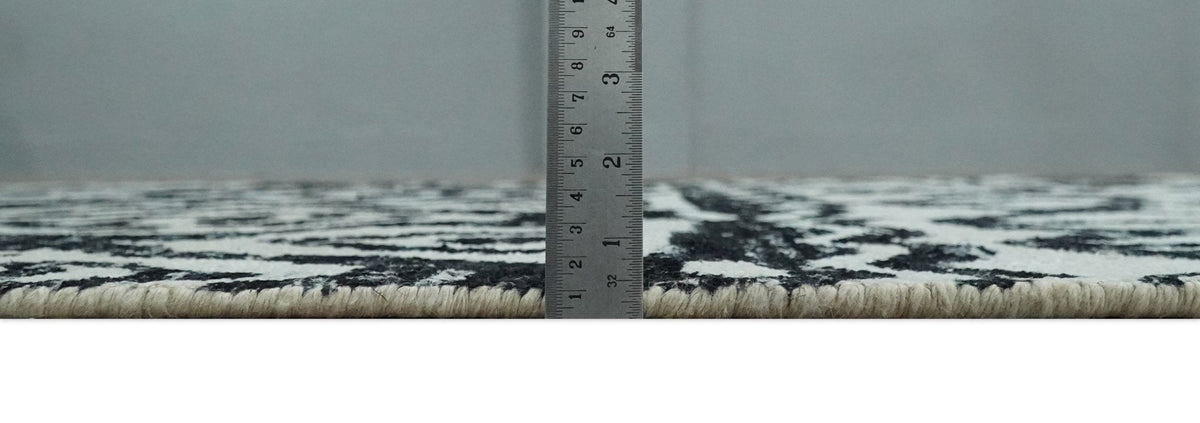 Hand Knotted Ivory and Black Modern Contemporary Recycled Silk Area Rug.