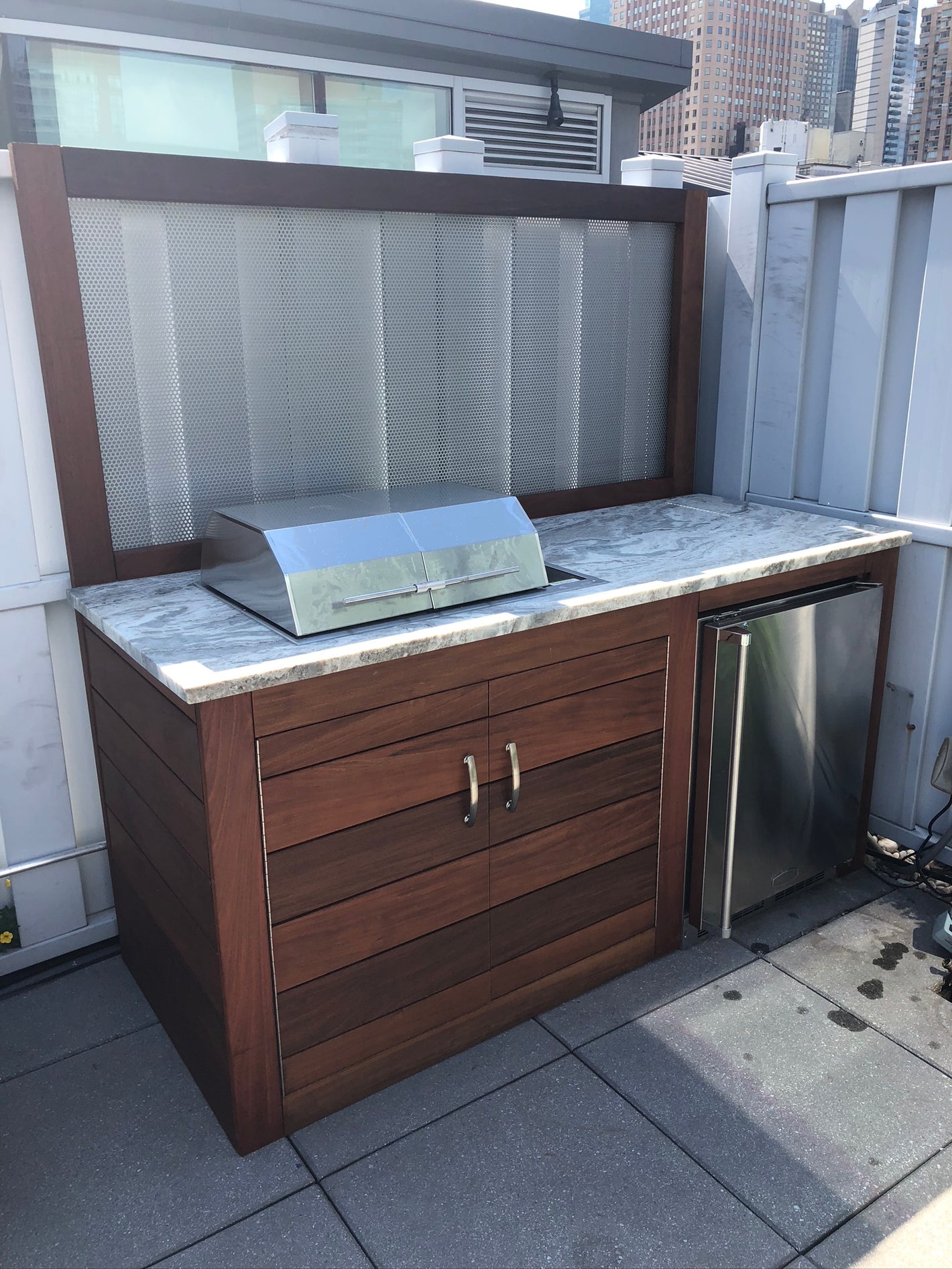 Custom outdoor ipe kitchen with granite countertop created by TCSC