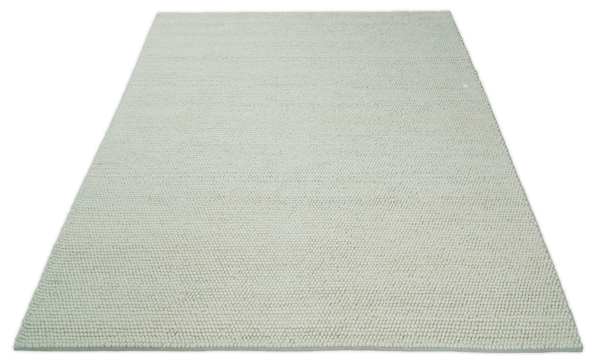 Solid Ivory Wool Felted Chunky Hand Woven Contemporary Area Rug.
