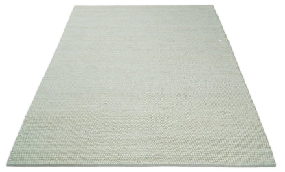 Solid Ivory Wool Felted Chunky Hand Woven Contemporary Area Rug.
