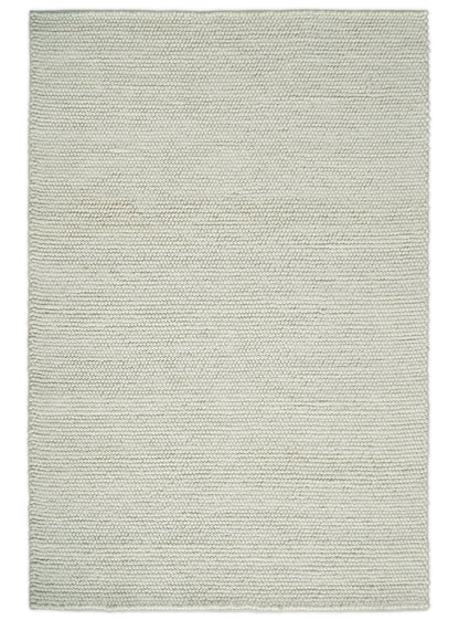 Solid Ivory Wool Felted Chunky Hand Woven Contemporary Area Rug.