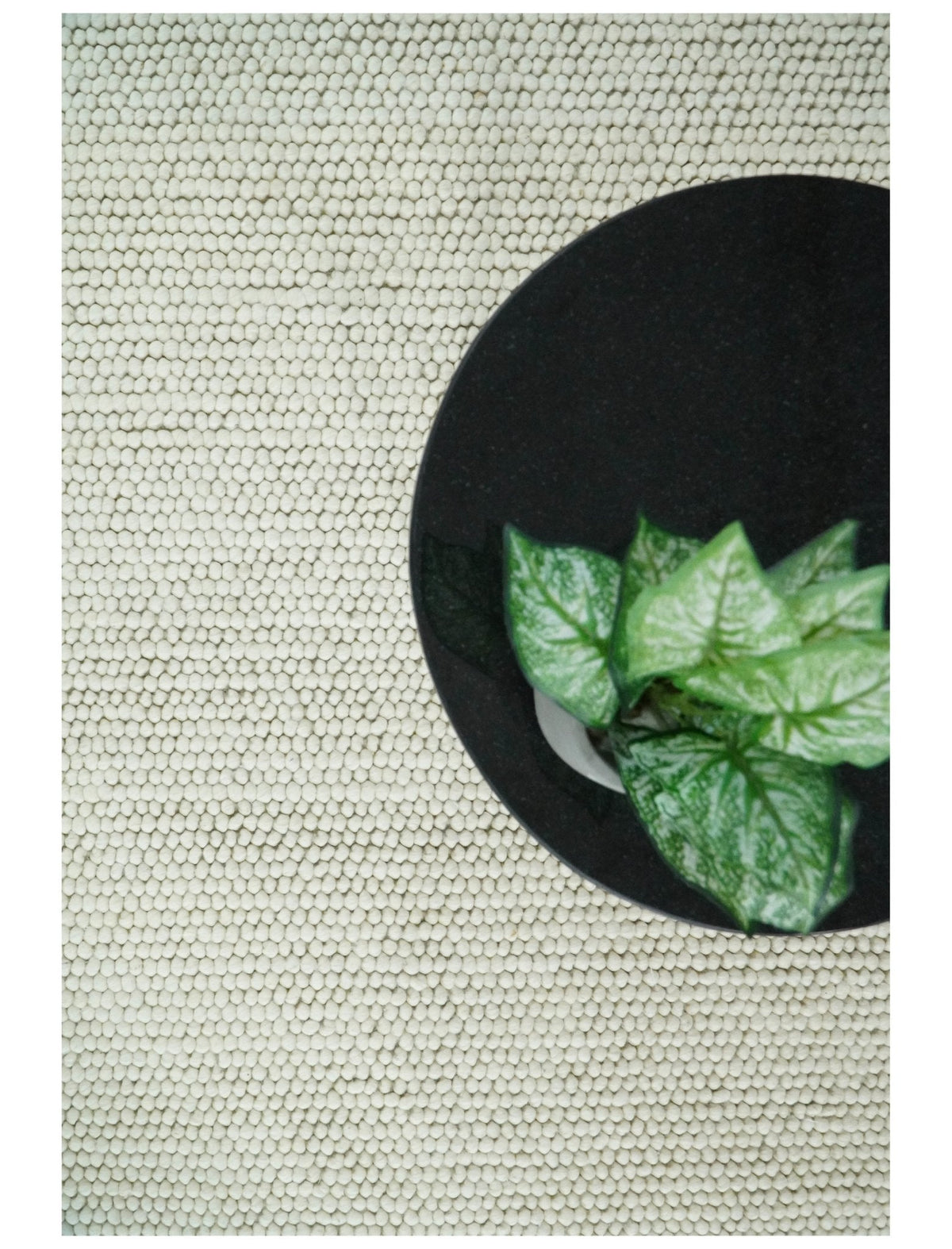 Solid Ivory Wool Felted Chunky Hand Woven Contemporary Area Rug.