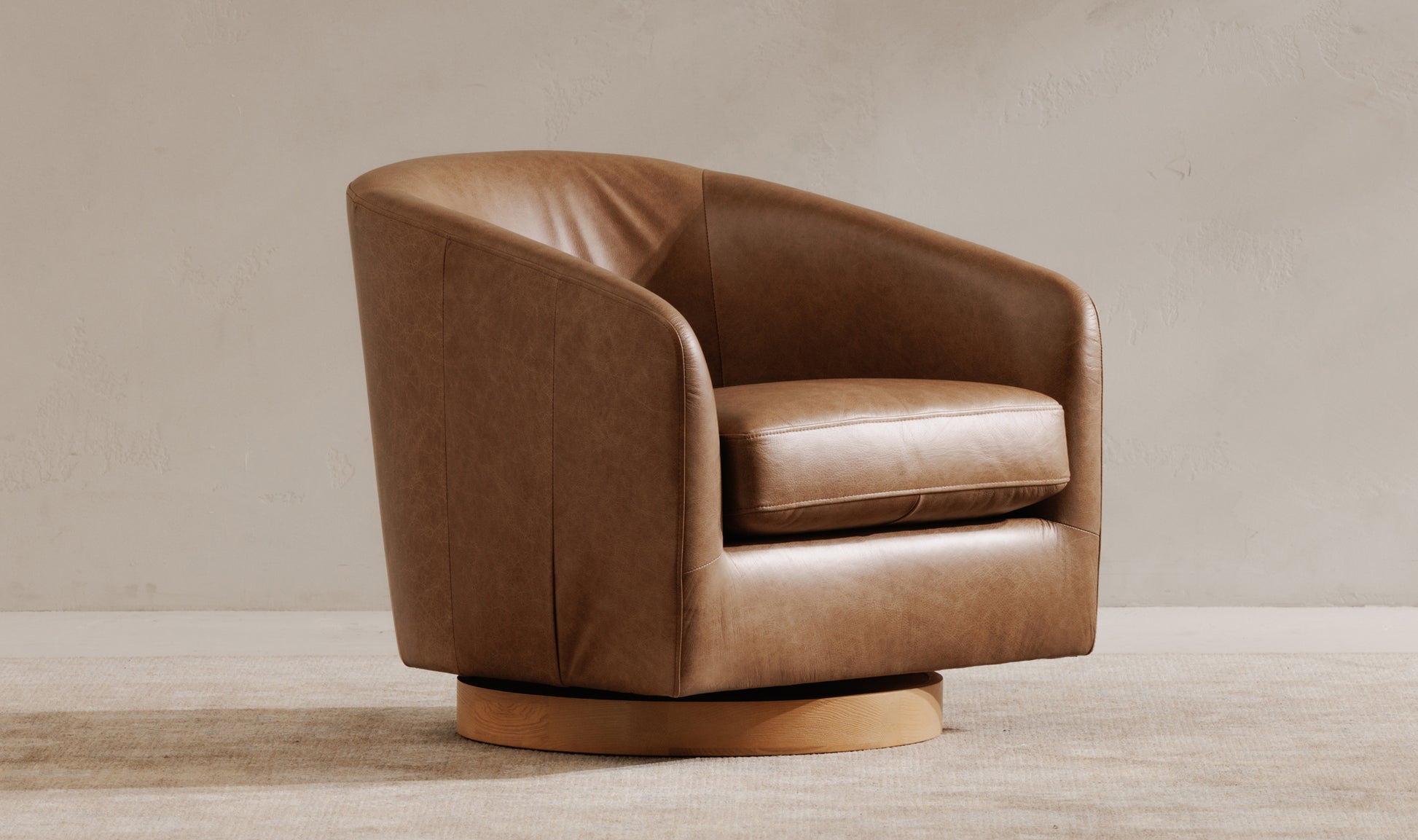 Oscy Leather Swivel Chair Tan.
