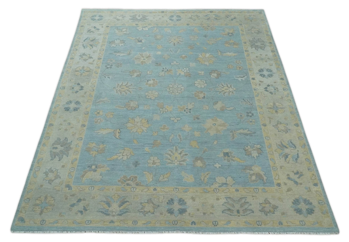 Blue and Beige Traditional Floral Hand Knotted Wool Rug.