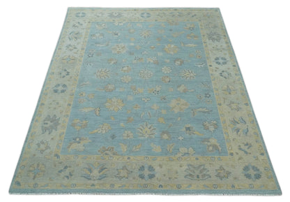 Blue and Beige Traditional Floral Hand Knotted Wool Rug.
