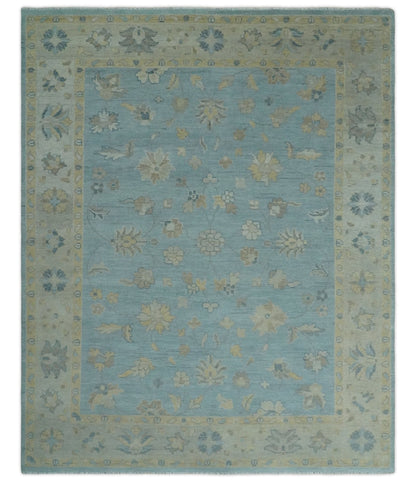 Blue and Beige Traditional Floral Hand Knotted Wool Rug.
