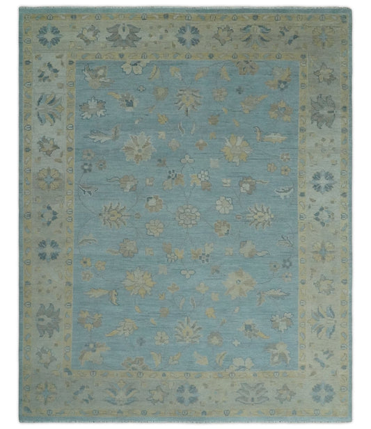 Blue and Beige Traditional Floral Hand Knotted Wool Rug.