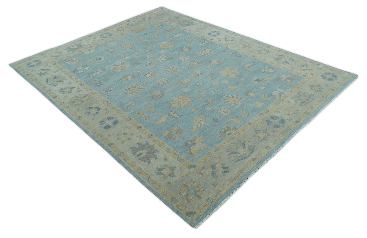 Blue and Beige Traditional Floral Hand Knotted Wool Rug.
