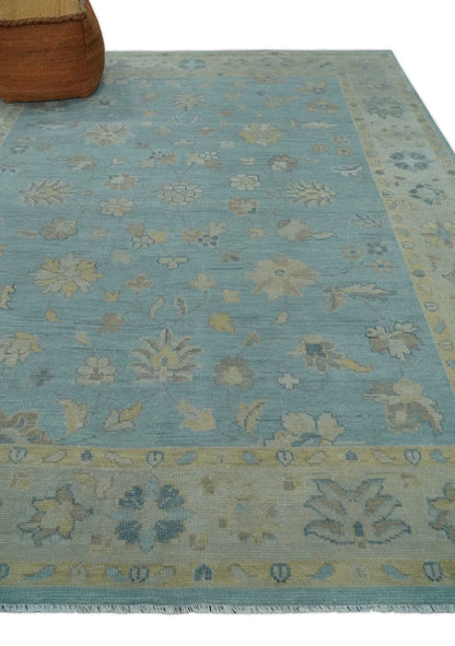 Blue and Beige Traditional Floral Hand Knotted Wool Rug.
